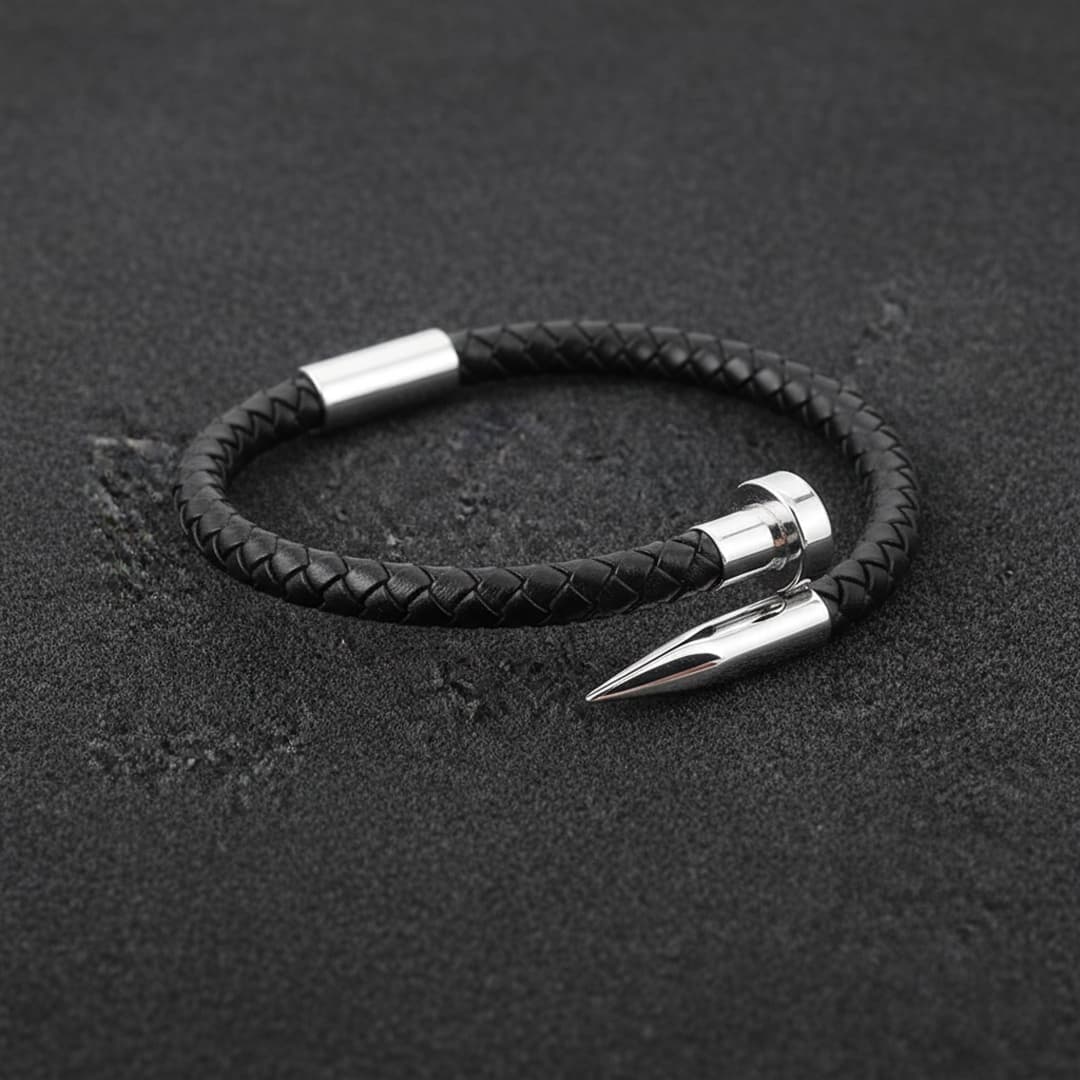 Brazalete "Clavo" – Cuero Trenzado y Acero Inoxidable